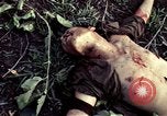 Image of dead Viet Cong Vietnam Vinh Te Canal, 1969, second 55 stock footage video 65675055543
