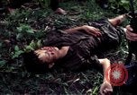 Image of dead Viet Cong Vietnam Vinh Te Canal, 1969, second 61 stock footage video 65675055543