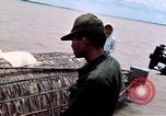 Immagine di Imbarcazione di pattuglia marinai di Fiume Il Vietnam Binh Thuy Air Base, 1967, secondo 23 filmato di repertorio 65675055547