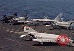 Image of U.S. Navy aircraft on flight deck of an aircraft carrier South China Sea, 1966, second 7 stock footage video 65675055557