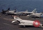 Image of U.S. Navy aircraft on flight deck of an aircraft carrier South China Sea, 1966, second 8 stock footage video 65675055557