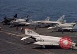 Image of U.S. Navy aircraft on flight deck of an aircraft carrier South China Sea, 1966, second 9 stock footage video 65675055557