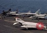 Image of U.S. Navy aircraft on flight deck of an aircraft carrier South China Sea, 1966, second 11 stock footage video 65675055557