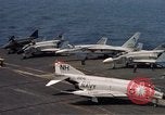 Image of U.S. Navy aircraft on flight deck of an aircraft carrier South China Sea, 1966, second 12 stock footage video 65675055557