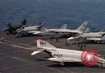 Image of U.S. Navy aircraft on flight deck of an aircraft carrier South China Sea, 1966, second 20 stock footage video 65675055557