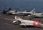 Image of U.S. Navy aircraft on flight deck of an aircraft carrier South China Sea, 1966, second 24 stock footage video 65675055557