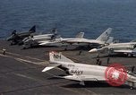 Image of U.S. Navy aircraft on flight deck of an aircraft carrier South China Sea, 1966, second 25 stock footage video 65675055557