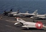 Image of U.S. Navy aircraft on flight deck of an aircraft carrier South China Sea, 1966, second 26 stock footage video 65675055557