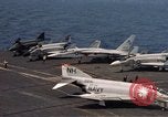 Image of U.S. Navy aircraft on flight deck of an aircraft carrier South China Sea, 1966, second 28 stock footage video 65675055557