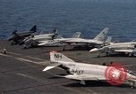 Image of U.S. Navy aircraft on flight deck of an aircraft carrier South China Sea, 1966, second 29 stock footage video 65675055557