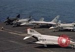 Image of U.S. Navy aircraft on flight deck of an aircraft carrier South China Sea, 1966, second 30 stock footage video 65675055557