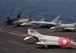 Image of U.S. Navy aircraft on flight deck of an aircraft carrier South China Sea, 1966, second 33 stock footage video 65675055557