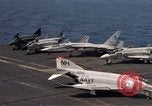 Image of U.S. Navy aircraft on flight deck of an aircraft carrier South China Sea, 1966, second 35 stock footage video 65675055557