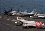 Image of U.S. Navy aircraft on flight deck of an aircraft carrier South China Sea, 1966, second 38 stock footage video 65675055557