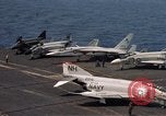 Image of U.S. Navy aircraft on flight deck of an aircraft carrier South China Sea, 1966, second 41 stock footage video 65675055557
