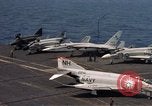 Image of U.S. Navy aircraft on flight deck of an aircraft carrier South China Sea, 1966, second 43 stock footage video 65675055557