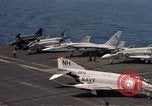Image of U.S. Navy aircraft on flight deck of an aircraft carrier South China Sea, 1966, second 44 stock footage video 65675055557