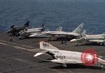 Image of U.S. Navy aircraft on flight deck of an aircraft carrier South China Sea, 1966, second 45 stock footage video 65675055557