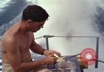 Image of crew men aboard Swift boat An Thoi Phu Quoc Vietnam, 1966, second 22 stock footage video 65675055562