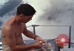Image of crew men aboard Swift boat An Thoi Phu Quoc Vietnam, 1966, second 23 stock footage video 65675055562