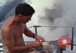 Image of crew men aboard Swift boat An Thoi Phu Quoc Vietnam, 1966, second 24 stock footage video 65675055562