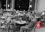 Image of American soldiers at French cafe Le Mans France, 1944, second 16 stock footage video 65675055594