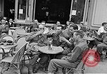 Image of American soldiers at French cafe Le Mans France, 1944, second 17 stock footage video 65675055594