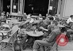 Image of American soldiers at French cafe Le Mans France, 1944, second 18 stock footage video 65675055594