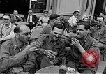Image of American soldiers at French cafe Le Mans France, 1944, second 21 stock footage video 65675055594