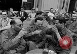 Image of American soldiers at French cafe Le Mans France, 1944, second 23 stock footage video 65675055594
