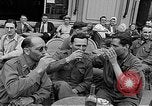 Image of American soldiers at French cafe Le Mans France, 1944, second 24 stock footage video 65675055594