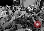 Image of American soldiers at French cafe Le Mans France, 1944, second 25 stock footage video 65675055594
