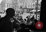 Image of American soldiers at French cafe Le Mans France, 1944, second 38 stock footage video 65675055594