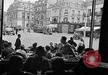 Image of American soldiers at French cafe Le Mans France, 1944, second 42 stock footage video 65675055594