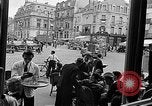 Image of American soldiers at French cafe Le Mans France, 1944, second 56 stock footage video 65675055594