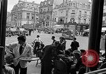 Image of American soldiers at French cafe Le Mans France, 1944, second 57 stock footage video 65675055594