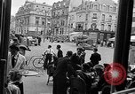 Image of American soldiers at French cafe Le Mans France, 1944, second 58 stock footage video 65675055594