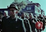 Image of German prisoners march Pilsen Czechoslovakia, 1945, second 56 stock footage video 65675055604