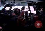 Image of navigator watches radarscope Philippines, 1979, second 21 stock footage video 65675055622