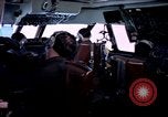 Image of navigator watches radarscope Philippines, 1979, second 23 stock footage video 65675055622