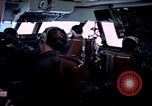 Image of navigator watches radarscope Philippines, 1979, second 24 stock footage video 65675055622