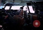 Image of navigator watches radarscope Philippines, 1979, second 31 stock footage video 65675055622