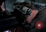 Image of navigator watches radarscope Philippines, 1979, second 39 stock footage video 65675055622