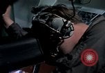 Image of navigator watches radarscope Philippines, 1979, second 40 stock footage video 65675055622