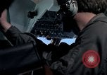 Image of navigator watches radarscope Philippines, 1979, second 46 stock footage video 65675055622