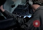 Image of navigator watches radarscope Philippines, 1979, second 47 stock footage video 65675055622