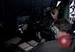 Image of navigator watches radarscope Philippines, 1979, second 61 stock footage video 65675055622