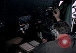 Image of navigator watches radarscope Philippines, 1979, second 62 stock footage video 65675055622