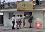 Standbild aircrew in Chow line Diego Garcia Insel im Indischen Ozean, 1979, aus Sekunde 27 historischem Filmmaterial Videoclip 65675055640