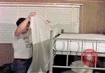 Image of airmen in trailer Diego Garcia Island Indian Ocean, 1979, second 1 stock footage video 65675055643